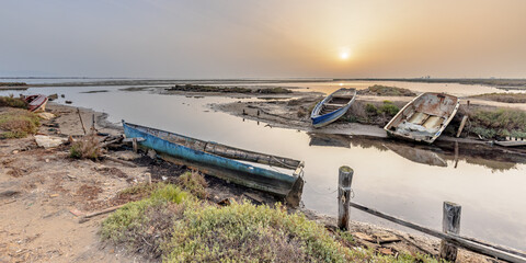 Wrecks of fishing boats in natural harbour