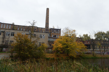 Fototapeta premium The abandoned Torgmash plant on the Lower Pond in Kaliningrad