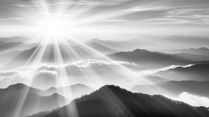 Breathtaking black and white mountain landscape with dramatic sun rays piercing through the clouds, creating a serene and majestic atmosphere.