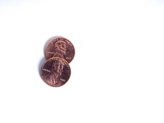 Advice concept with two pennies on white background
