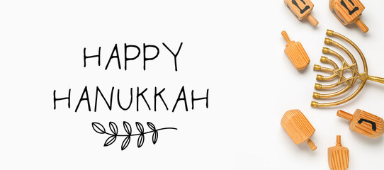 Hanukkah composition with menorah and dreidels on white background