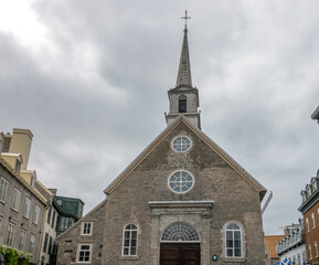 Fototapeta premium Notre Dame des Victoires, the oldest stone chruch in North America, Place Royale, Petit Champlain district, Quebec City, Quebec, Canada