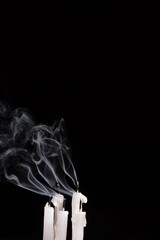 Candle and smoke extinguished Smoke Art on black background