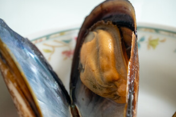 mussels on a antique white plate
