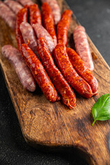 raw sausages beef, pork, chicken, lamb, dish fresh delicious gourmet food background on the table rustic food top view copy space