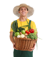 Male farmer with basket of vegetables on white background