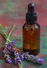 lavender essential oil for better good health. Calming relaxing aromatherapy concept. flower on top of the bottle