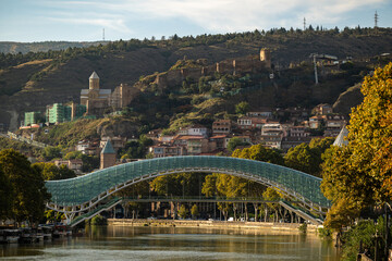 Fototapeta premium View on the Bridge of Peace over Kura river in the city center of Tbilisi, Georgia