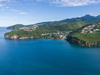 Drone view of the coast near Case-Pilote with the mountains in the background, Martinique, West...