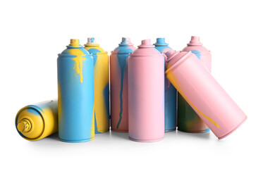 Different spray paint cans on white background