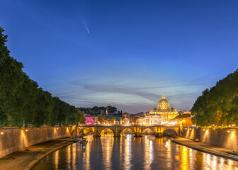 Night long exposure of Rome with river Tiber and Vatican St Peter's basilica cathedral at night with comet C2023 A3 Tsuchinshan ATLAS in star sky © Thomas