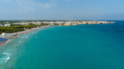 Obraz premium Aerial view of the bay of Torre dell'Orso in the province of Lecce, Salento, Puglia, Italy. It is an Apulian tourist town overlooking the Adriatic Sea.