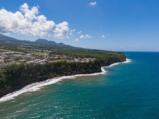 Coastal village on a cliff over the ocean at basse-pointe, Martinique