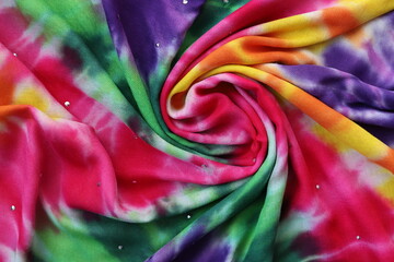 Colorful wavy fabric. Abstract background. Draped cotton fabric. 