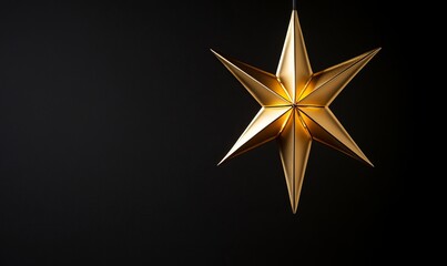 Gold star light hanging on dark background