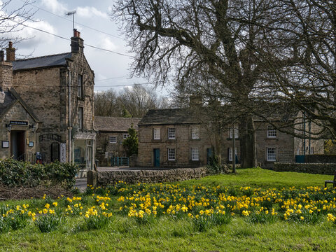 BASLOW, DERBYSHIRE, UK - APRIL 18, 2013:   View across Goose Green, the Village Green, at Nether End in Spring