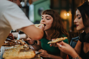 A group of friends savoring freshly baked pizza in a warm, inviting restaurant setting. The image captures the joy and camaraderie of sharing a meal together.