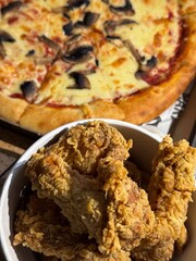 chicken legs and pizza Fastfood