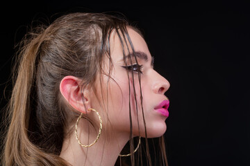 Fototapeta premium Fashion make up. Professional makeup. Beauty woman face with vogue makeup. Makeup model. Fashion make up of pretty woman. Fashionable young woman. Portrait of a gorgeous fashion young woman.