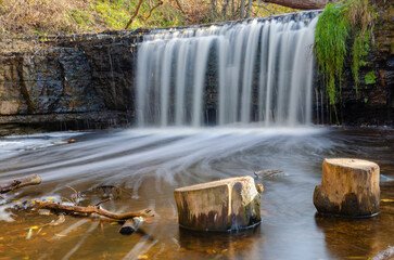 Sablinsky waterfall on a sunny October day . 