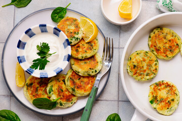 Cheese pancakes with mozzarella, spinach and yogurt-garlic sauce..top veiw