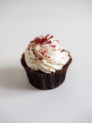 delicious sweet cupcake on white background, front view