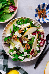 Salad with pear, blue cheese and walnuts.. selective focus