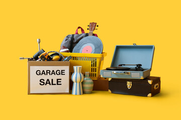 Unwanted stuff for garage sale on yellow background