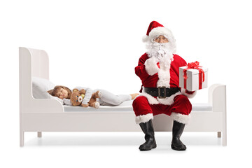 Santa claus delivering a present to a sleeping girl