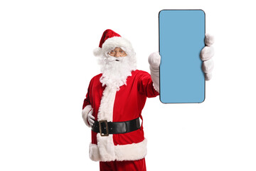 Santa Claus holding a smartphone with blue screen