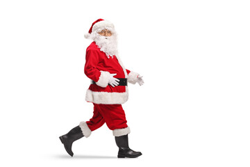 Santa Claus walking and looking at camera