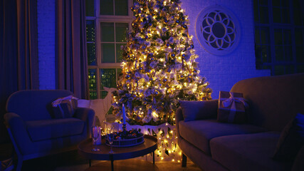 Festively decorated christmas tree is illuminating a cozy living room, with wrapped gifts placed on the sofas, creating a warm and inviting atmosphere