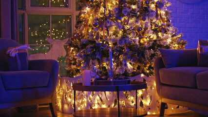 Cozy living room with a beautifully decorated christmas tree, golden baubles, and wrapped gifts, creating a warm and festive atmosphere perfect for celebrating the holidays