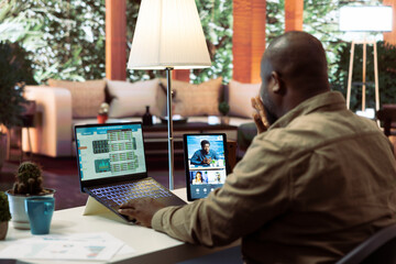 Business owner meeting on videoconference call with shareholders to obtain funding for the...