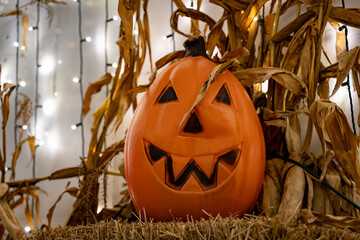 Decorated Halloween Jack-o-Lantern Pumpkin at night time.