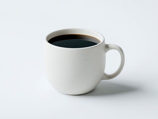 White coffee cup filled with black coffee, isolated on white background.