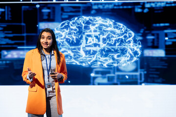 IT professional holding presentation exploring ways emerging AI technologies can enhance businesses...