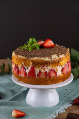 Strawberry Cake in Rustic Style. Vertical photo