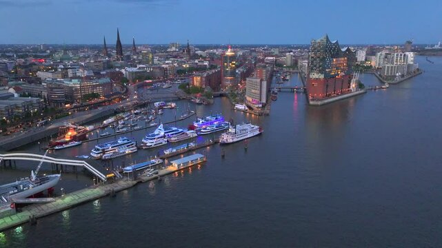 Aerial View of Elbphilharmonie and HafenCity at Night after sunset, Hamburg, Hanseatic City. Modern Building in Germany