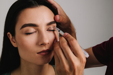 Blepharoplasty. Drawing on skin of eyelids for accurate face lifting and safe surgery to remove excess skin. Plastic surgeon is marking up contour for upper blepharoplasty.