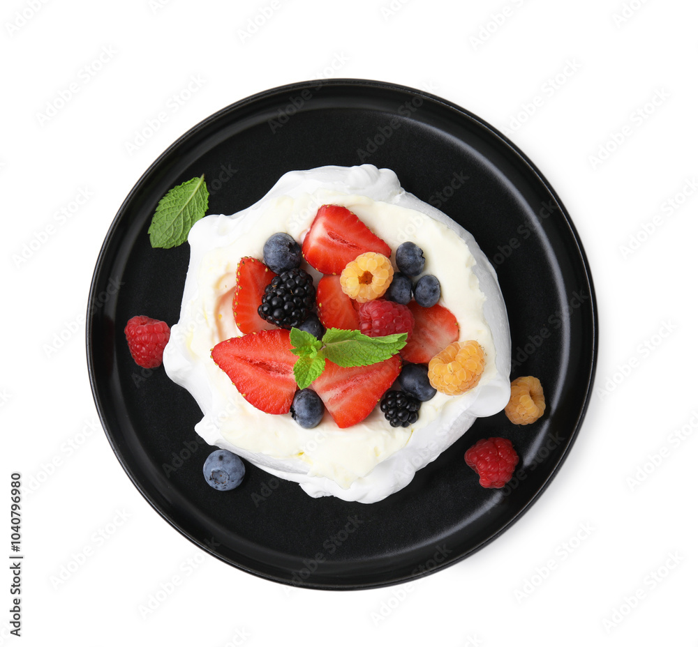 Poster Pavlova cake (meringue dessert) with whipped cream, fresh berries and mint isolated on white, top view