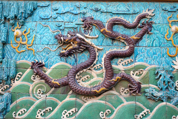 Chinese glazed tile dragon sculpture，Kowloon Wall in Beihai Park, China，The nine dragon walls...