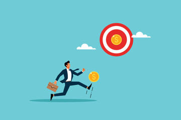 Smart businessman kicking a ball of gold coins towards the right target