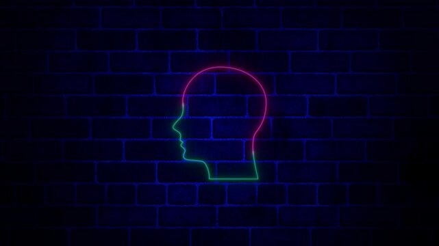 neon, glowing, colorful man head icon video animation on brick wall.Side View Silhouettes of Diverse Human Faces for Business, Discussion, and Symbolic Representation in a Modern Design Aesthetic