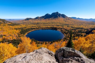 Autumn mountains covered in vibrant foliage, framed in a wide panoramic shot with crisp air and deep blue sky