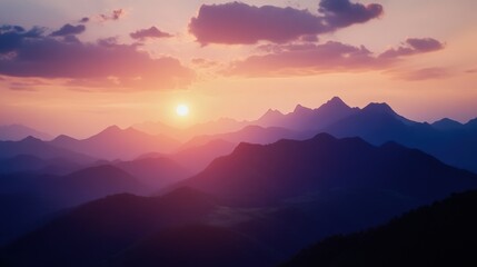 Fototapeta premium Dawn Breaks Over Majestic Peaks, a captivating display of sunlight cascading over rugged mountain silhouettes at sunrise.