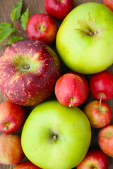 variety of ripened apples, food background 