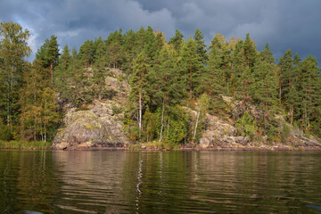 View of the rocky shores of Lake Ladoga near the village of Lumivaara on a sunny autumn day, Ladoga Skerries, Lahdenpohya, Republic of Karelia, Russia