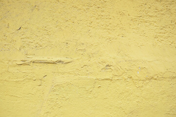 A Textured Yellow Wall Background Perfect for Various Design Projects and Inspirations