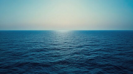 Fototapeta premium Serene Blue Hues Over Calm Ocean Waters